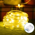 Aigostar - Cadena de luces de Navidad LED 50xLED/3xAA 5,3m blanco cálido
