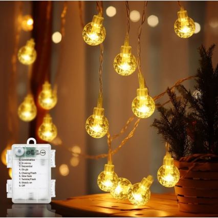 Aigostar - Cadena LED navideña exterior 100xLED/3xAA/8 funciones 10,3 m IP44 blanco cálido