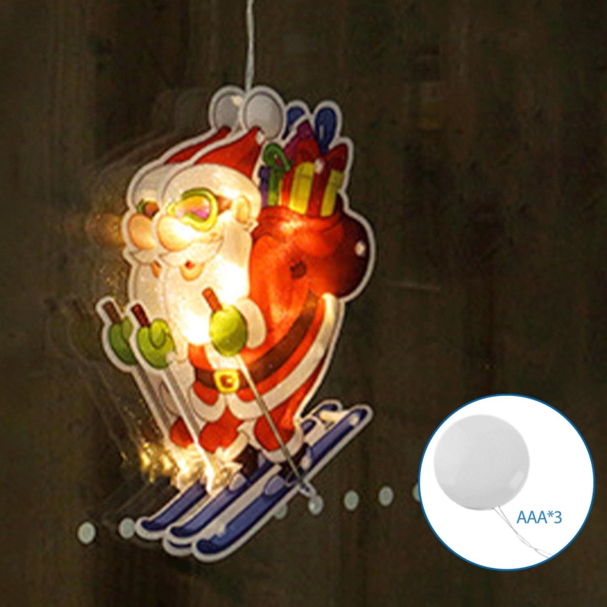 Aigostar - Decoración navideña LED LED/3xAAA Papá Noel en esquís 23cm