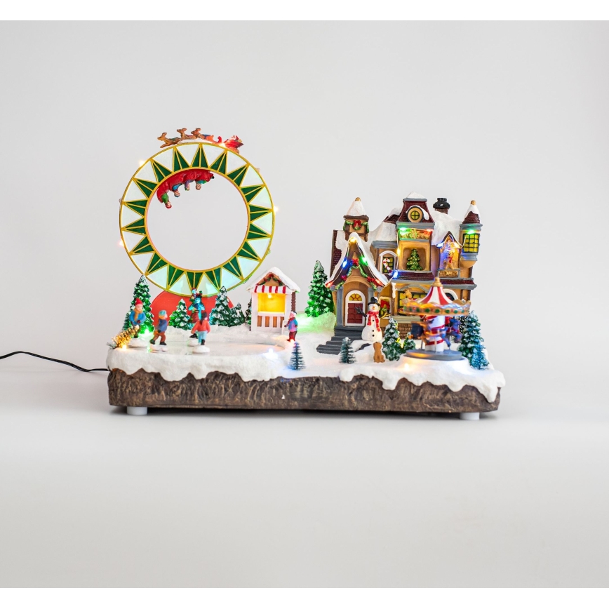 Decoración navideña animada LED RGB con música 30xLED/1,5W/230V pueblo nevado