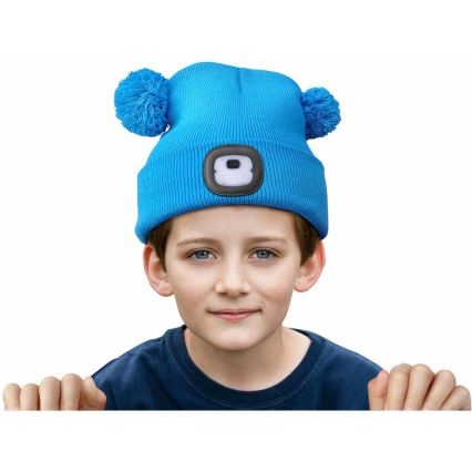 Extol - Gorra con linterna frontal y carga USB 250 mAh azul con pompones talla infantil