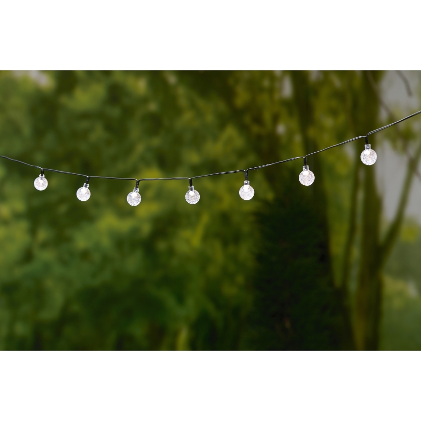 Grundig - Cadena solar LED 50xLED/8 funciones 6,9m blanco cálido