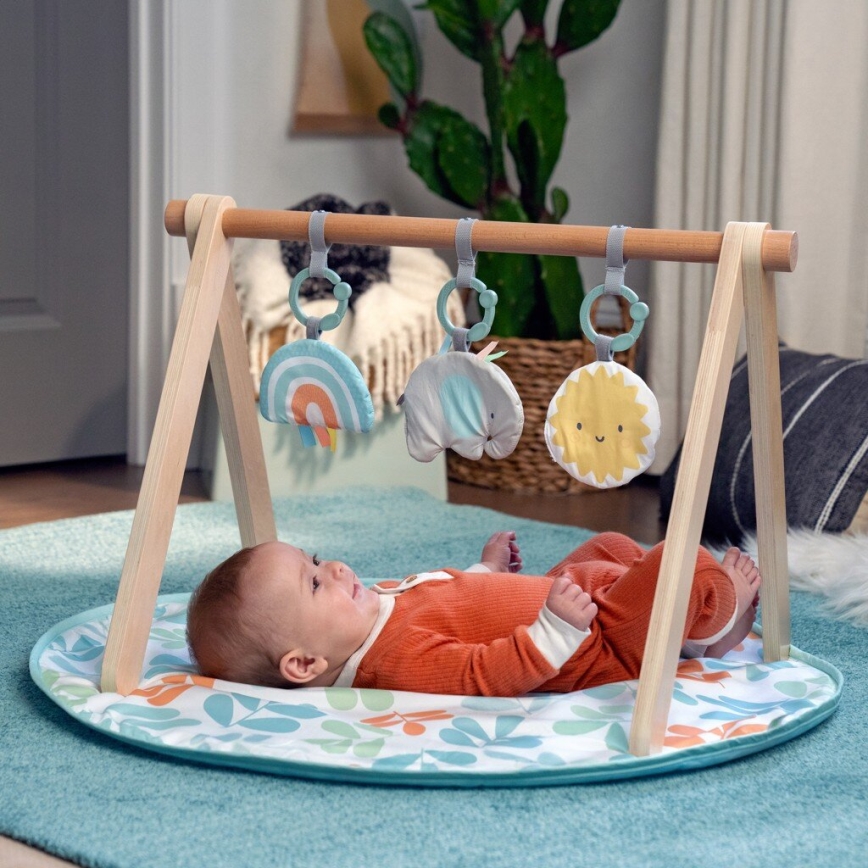 Ingenuity - Manta infantil para jugar con un trapecio de madera SOL VALLEY
