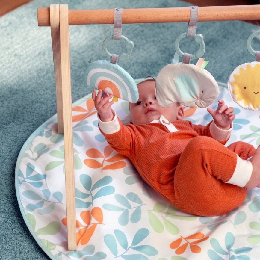 Ingenuity - Manta infantil para jugar con un trapecio de madera SOL VALLEY