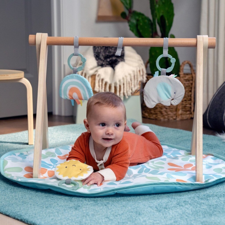 Ingenuity - Manta infantil para jugar con un trapecio de madera SOL VALLEY