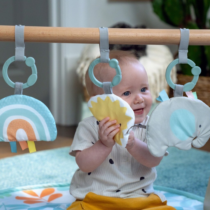 Ingenuity - Manta infantil para jugar con un trapecio de madera SOL VALLEY