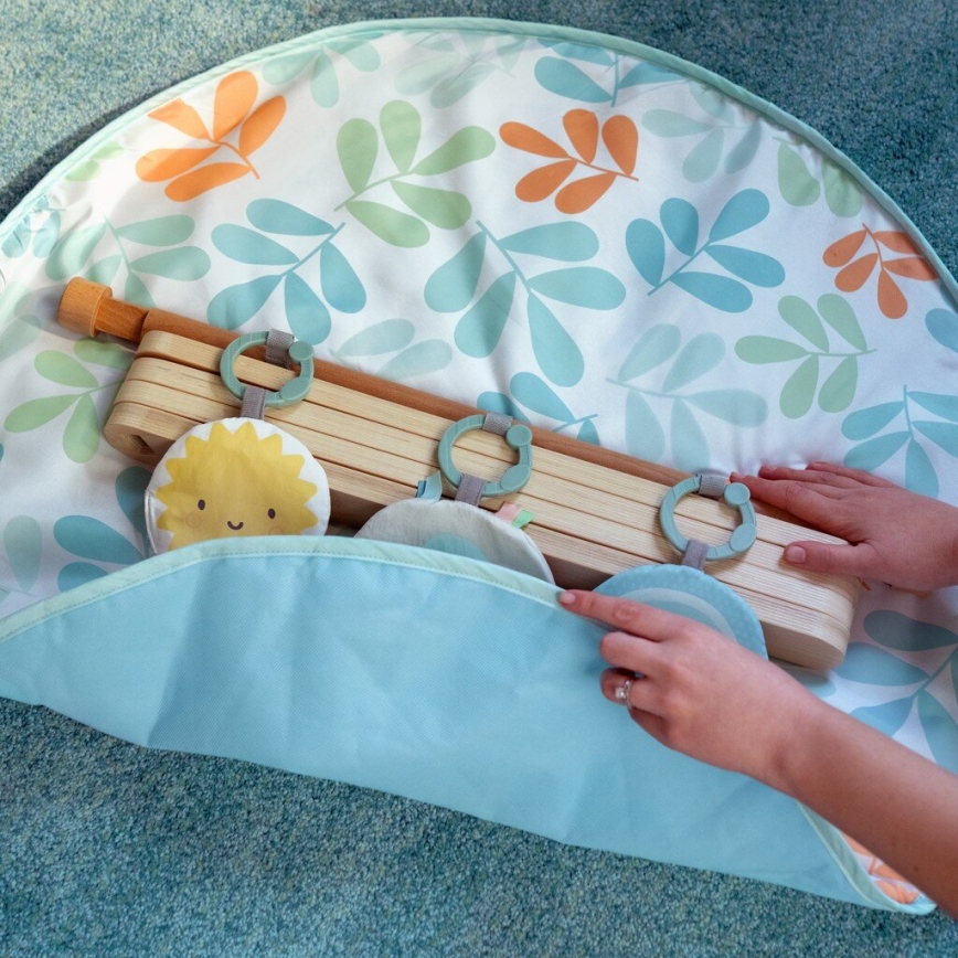 Ingenuity - Manta infantil para jugar con un trapecio de madera SOL VALLEY