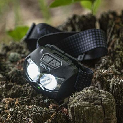 Linterna frontal LED recargable y regulable con sensor y luz roja 2xLED/5W/5V/3xAAA IP65 500 brillante 1200 mAh