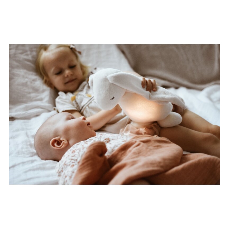 Moonie - Pelele con melodía y luz 2.0 conejo organic rosa