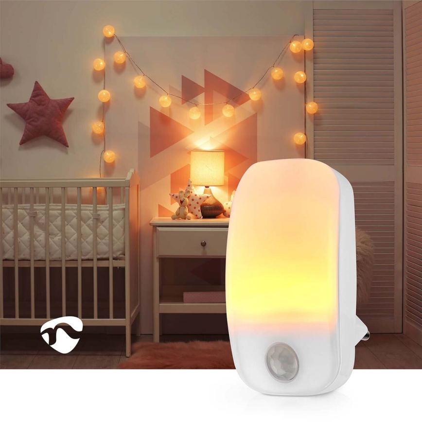 Luz LED de orientación para enchufe con sensor de movimiento y crepuscular LED/0,55W/230V blanco