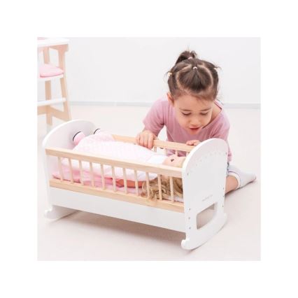 New Classic Toys - Cama de madera para muñecas rosa