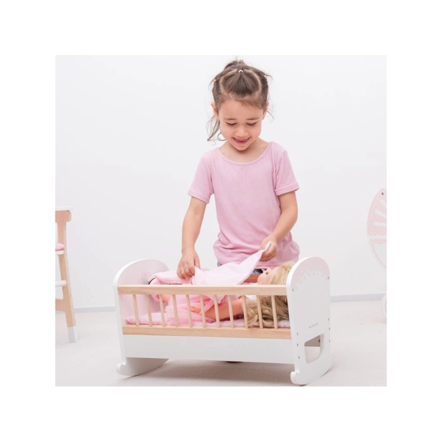 New Classic Toys - Cama de madera para muñecas rosa
