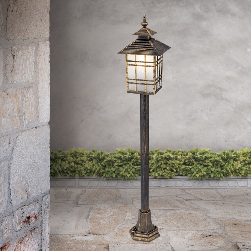 Lámpara de exterior KIKO 1xE27/11W/230V IP44 bronce/pátina