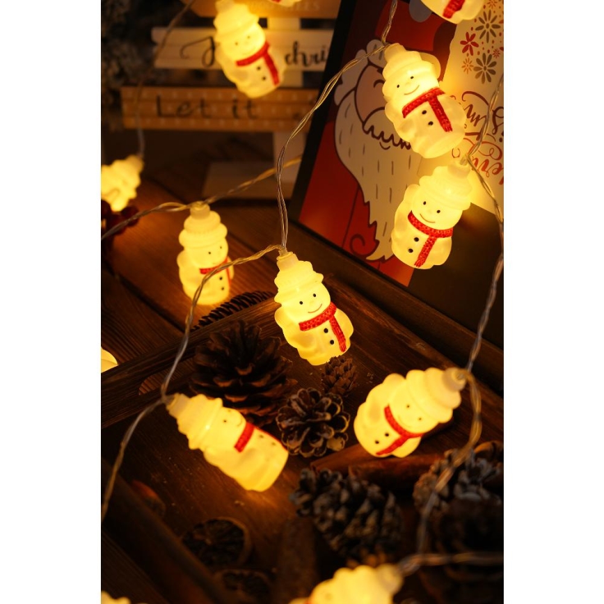 Cadena de Navidad LED 20xLED/3xAA/blanco cálido 3,3m muñecos de nieve
