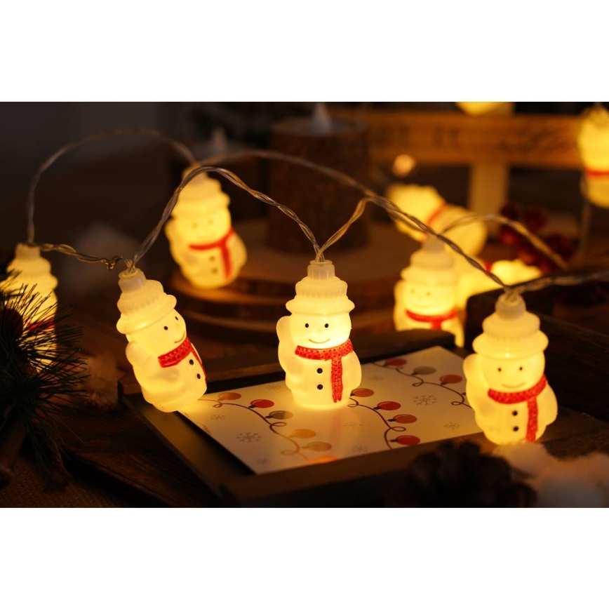 Cadena de Navidad LED 20xLED/3xAA/blanco cálido 3,3m muñecos de nieve