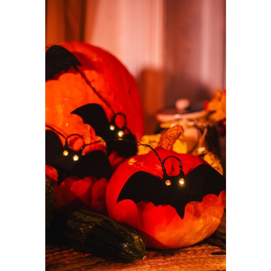 Cadena decorativa LED HALLOWEEN 10xLED/2xAA/blanco cálido 1,3m murciélagos