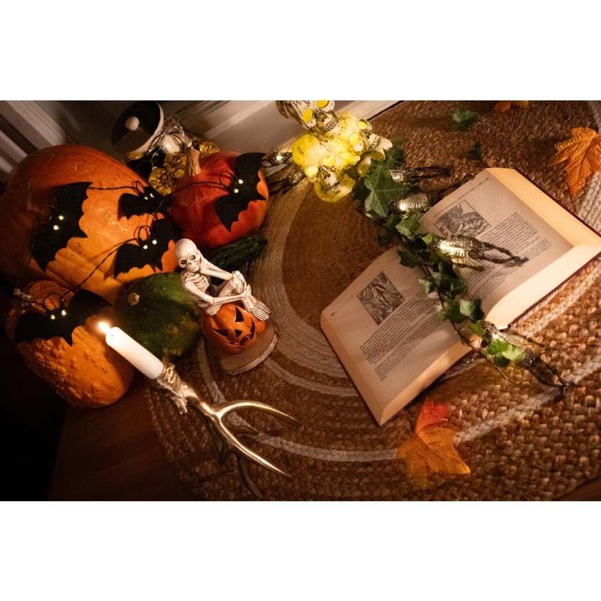 Cadena decorativa LED HALLOWEEN 10xLED/2xAA/blanco cálido 1,3m murciélagos