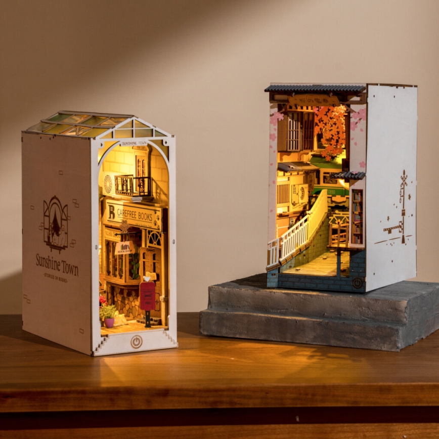 RoboTime - Sujeta-libros LED Pueblo Soleado 2xAAA.