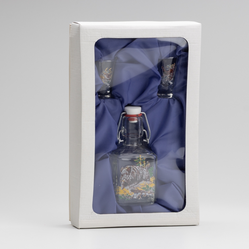 Set 1x botella de vidrio y 2x Vaso de chupito transparente con un motivo de jabalí