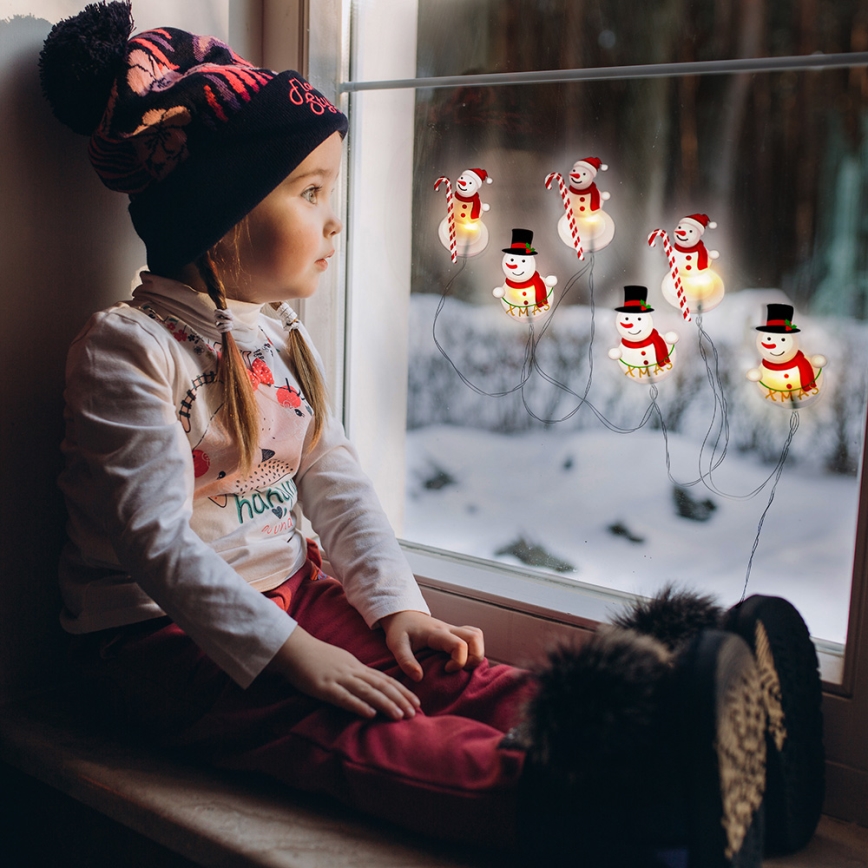 Cadena de Navidad LED con ventosas 6xLED/2xAA 1,2m muñeco de nieve blanco cálido