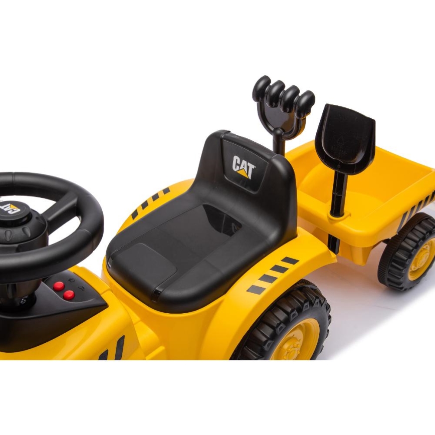 Tractor de empuje para montar CAT amarillo/negro